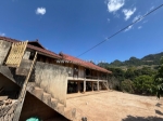 Mộc châu: đất 9000m² có 400m² thổ cư, 2 mặt đường, nhà sàn, vườn cây, giá 7,3 tỷ