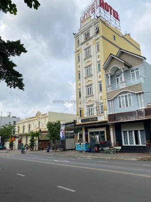 Bán khách sạn ngay big c go dĩ an – bình dương -124m² (6.2m x 20m) – dt :