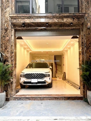 Trần quốc hoàn 40m x7 tầng thang máy 21,7 tỷ- phân lô-gara ô tô,vỉa hè-20m ra