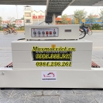 Máy co lốc màng chai lọ tự động