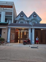 Nhà mới 100% 1 trệt 1 lầu , mái thái,  mặt tiền dx 065 phường định hòa tp. thủ