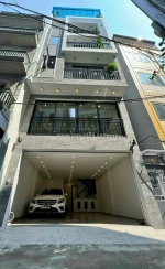 Bán nhà bát khối, gara, thang máy, 2 thoáng, nhà mới 42m2-9,2 tỷ