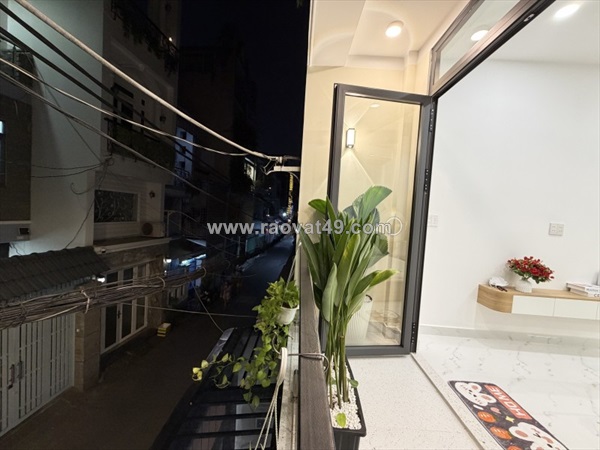 Bán nhà phú nhuận oto vào nhà 60m2 2 tầng nở hậu 5m đẹp kd đỉnh thích quảng đức