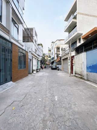 Bán nhà phú nhuận oto vào nhà 90m2 6 tầng ngang 4m chdv 14 pn phan đăng lưu