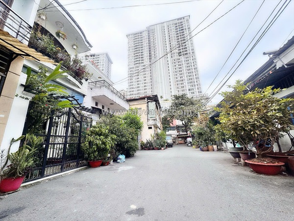 Hiếm ngang 5m nở hậu 6,6m * 16m vuông đẹp - bán nhà 5 tầng thang máy đ.bến vân