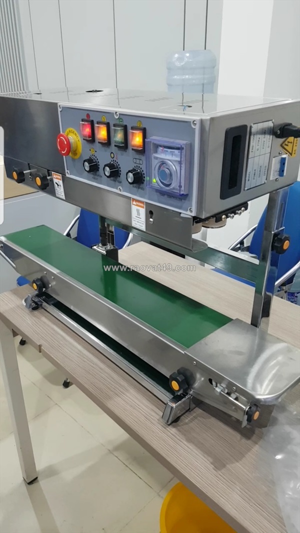 Máy hàn miệng túi liên tục, máy ép miệng túi có chứa dịch nước