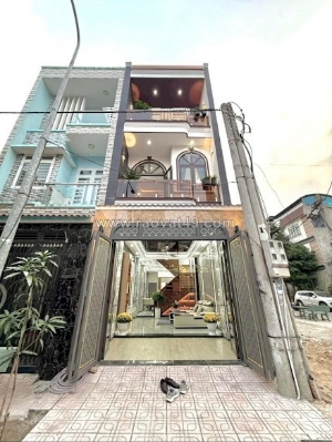 Bán nhà 1 trệt 1 lầu gara xe hơi gần trung tâm y tế dĩ an!