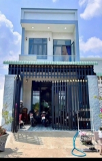 Nhà 1 lầu 105m2 sổ hồng riêng gần chợ hưng long bình chánh